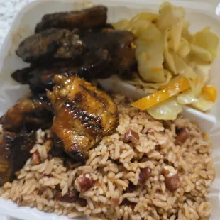 Jerk wings with rice and cabbage