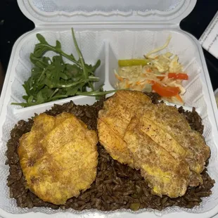 Black rice djon djon , pickliz , and a sad salad