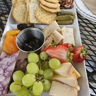 Gittas charcuterie  board and myself and 2 friends. Its become one of our favorite spots