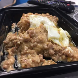 Sausage gravy &amp; biscuits with a poached egg on top