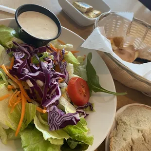 Salad and fresh Basket Of Bread
