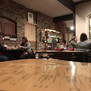 a group of people sitting in a restaurant