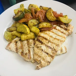 Grilled chicken with fresh vegetables.