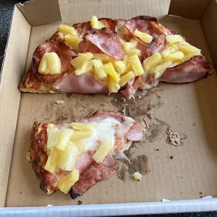 Hawaiian Canadian bacon and pineapple and pizza, they don&apos;t skimp on the pineapple, crust was perfect. The pizza was fantastic.