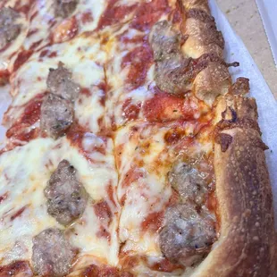 Pizza with cheese and sausage