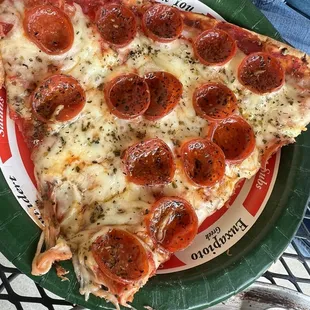 Slice of pepperoni, about a 1/4 of a pizza for $5