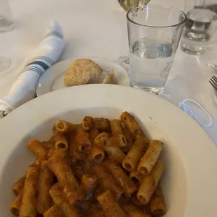 a plate of pasta and bread