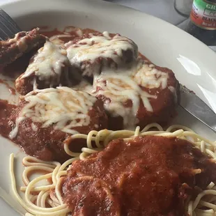 Eggplant parmigiana with a side of Al dente spaghetti and marinara.