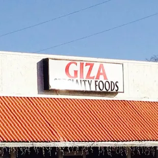 a sign on the side of a building