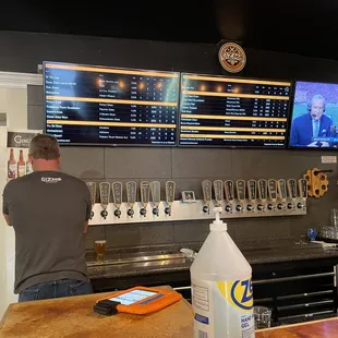 two men working at a bar