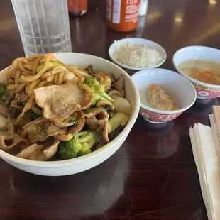 Chow mein with side of steamed rice, potsticker and soup