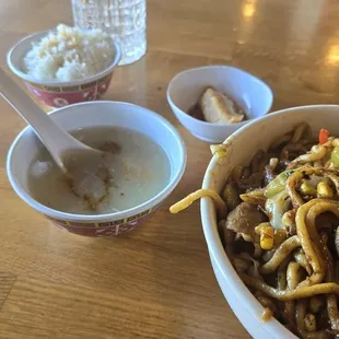 My bowl, with a side of soup, rice, pot stickers and a glass of sprite