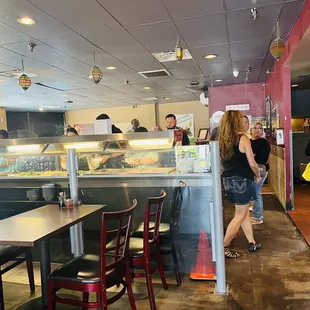 a group of people in a restaurant