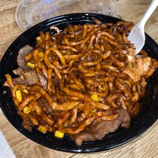 a plate of beef and pretzels