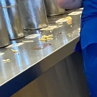 Food and sauce all over counters