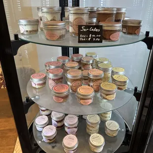 a display of various flavors of desserts