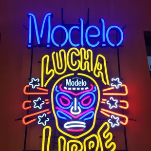 a neon sign for a mexican restaurant