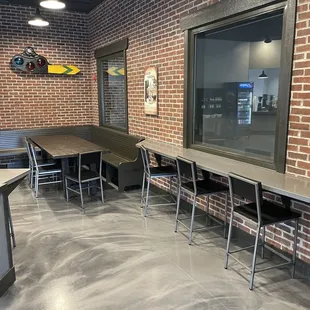 tables and chairs in a coffee shop