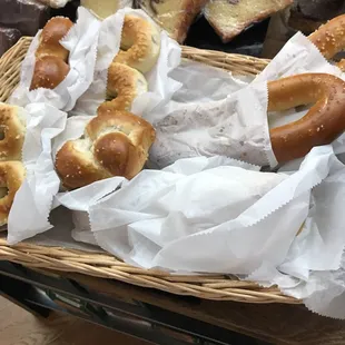 a basket of bread and pastries