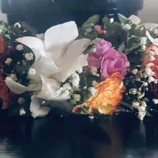 Colorful Lei Po'o.  Taken 4 days later after plane ride.  Still soft and smelling wonderful.  Quality work .