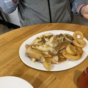 Country fried steak, onion, rings, and mashed potatoes.