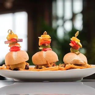three sliders and french fries