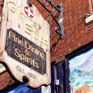 Sign hanging over the front door