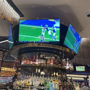 Perfect size tv around the main center bar! #PHGlassBarLounge