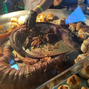 Bacon wrapped alligator sliders