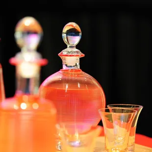 an assortment of liquor bottles on a table