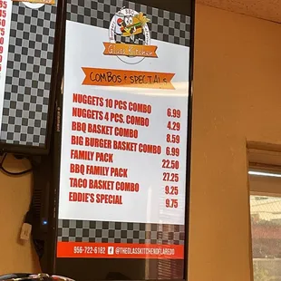 a menu on the wall of a restaurant
