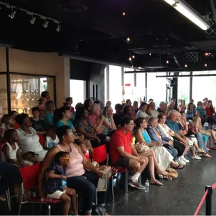 Audience for glass blowing at Glass Museum