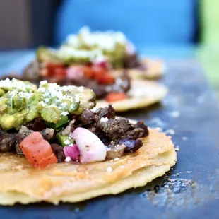 two tacos on a table