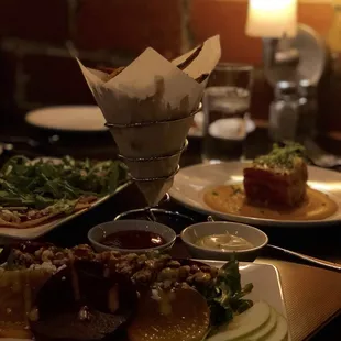 The beet salad, fries, coca bread, and sweet potato lasagna