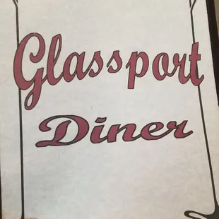 a hand holding a sign that says glassport diner