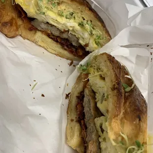 Croissant with Egg, Cheese, Bacon, Sausage w/added sprouts