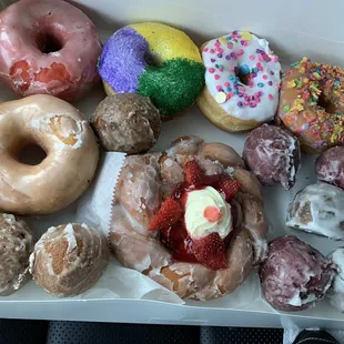 A variety of donuts and buttermilk drops to choose from.