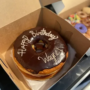 My special order chocolate frosted chocolate cream filled donut cake!