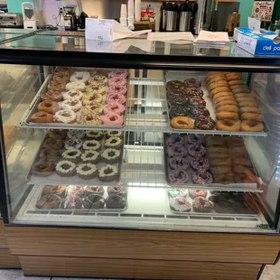 a display case of doughnuts