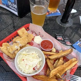 Fried catfish with fries and slaw.