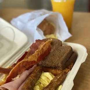 bacon and eggs in a styrofoam container