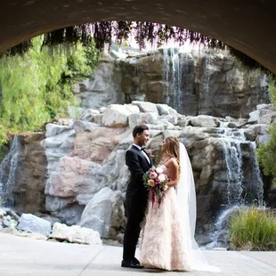 Our venue has many photo opportunities to choose from. This is one of our three waterfalls located on the property!!