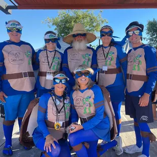 Our superhero coaching staff in uniform for Championships