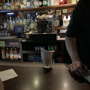 a bartender at the bar