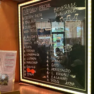 a menu on a blackboard