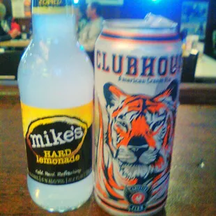 a bottle of clubhouse and a can of clubhouse