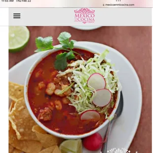 a bowl of chili and tortilla