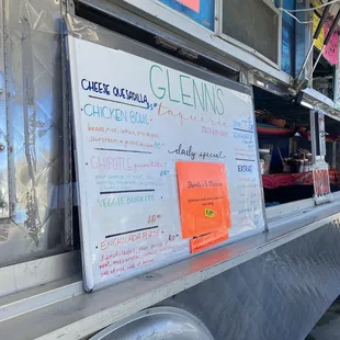 a food truck with menus