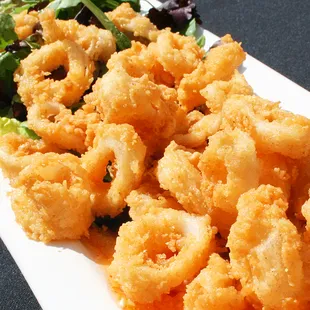 Fresh calamari rings served atop a Thai chili sauce