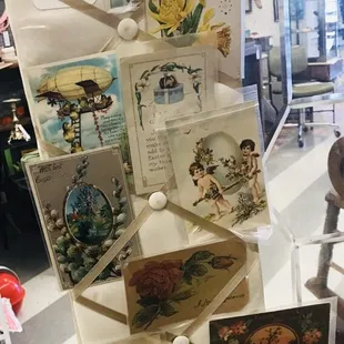 Seasonal vintage postcards, most 100+ years old.